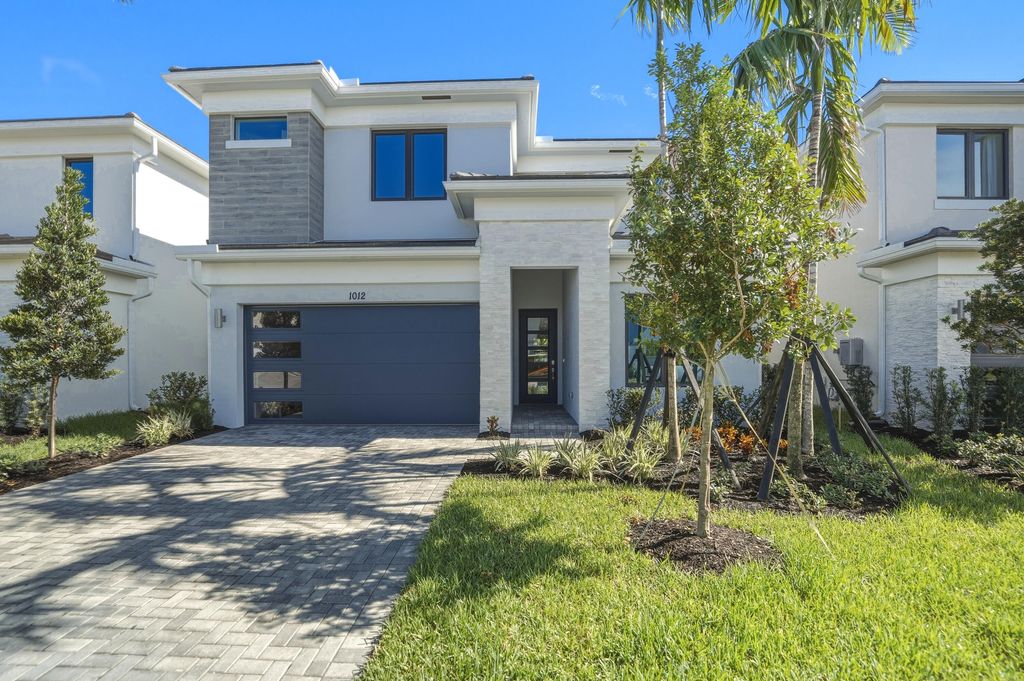 Photo of 1012 Raleigh Way, Wellington, FL 33414 (MLS # B26036955)