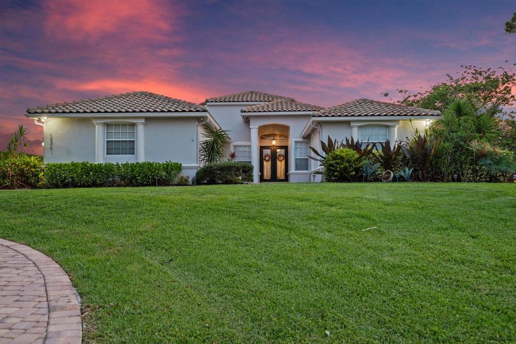 Photo of 1936 SW Wood Duck Lane, Palm City, FL 34990 (MLS # R11093114)