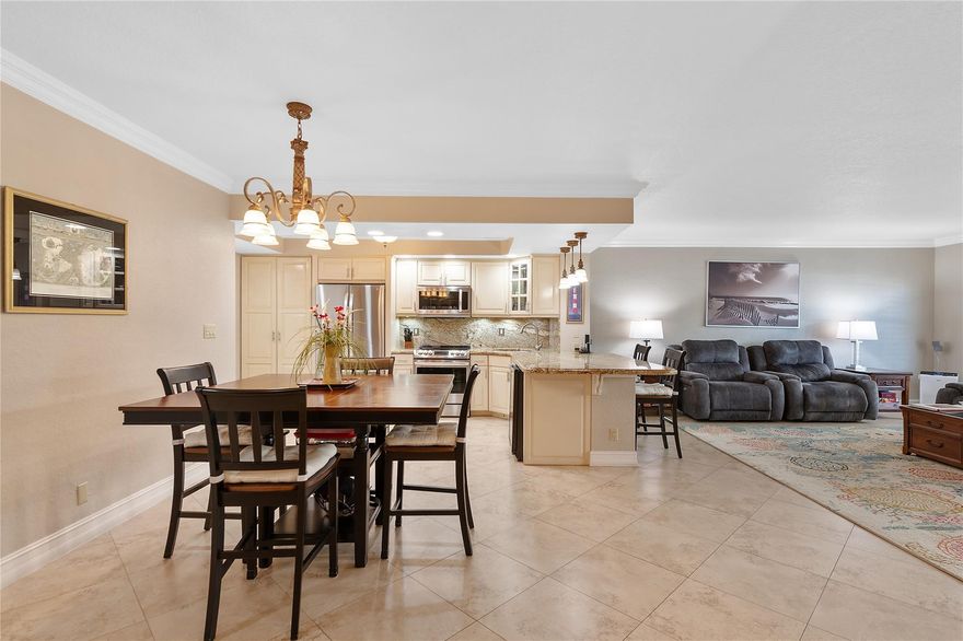 1st-floor, 2-bed, 2-bath renovated unit includes aesthetic upgrades such as creamy kitchen cabinets, granite countertops, stainless steel appliances, porcelain floors, and crown molding. Structural improvements included raising the ceiling height, re-routing the air-conditioning vents, and removing walls resulting in a beautiful, spacious, and bright home with a warm and homey atmosphere. The 1st-floor location provides privacy by not having to walk through the lobby to access your home as well as easy access to the beach. Amenities include a fitness center, 24-hour security, a game room, beach chairs and umbrellas for residents, and a car wash area. Washer and dryer in the unit. Storage unit on the same floor. Ample outdoor parking. No balcony.