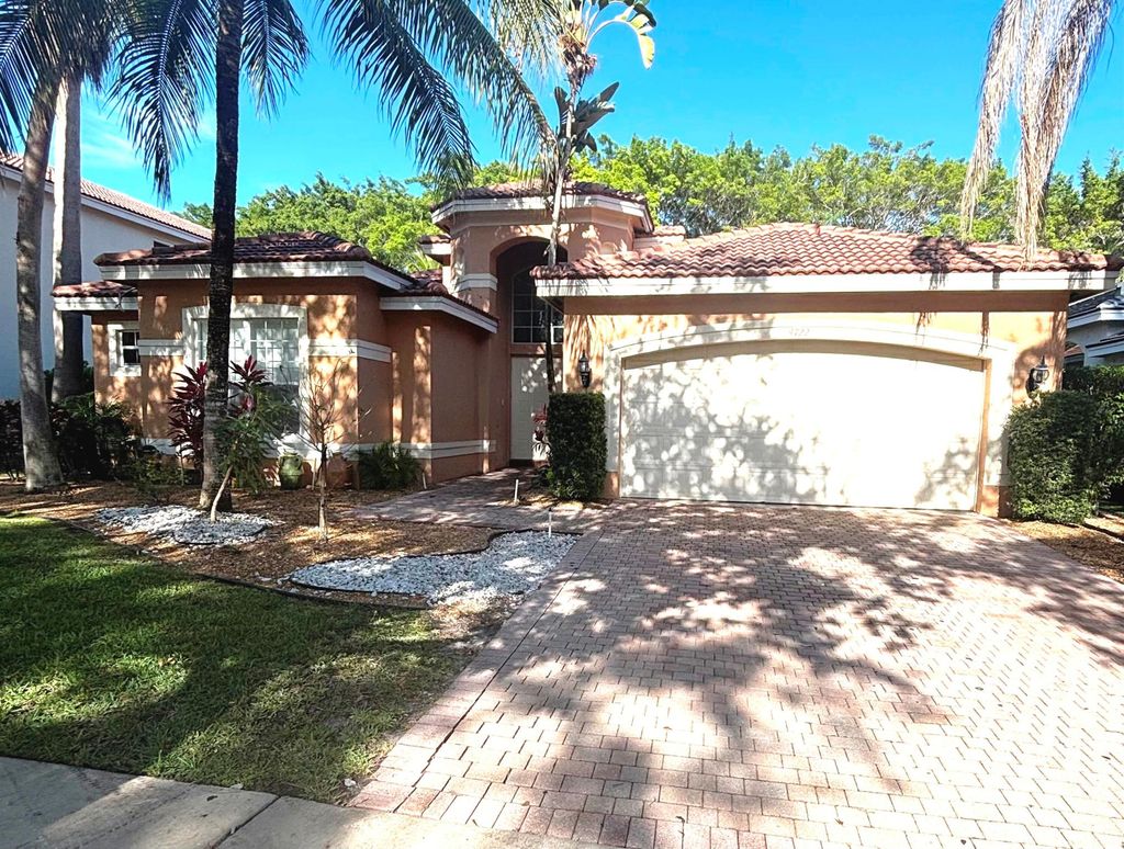 Photo of 9722 Napoli Woods Lane, Delray Beach, FL 33446 (MLS # R11088493)