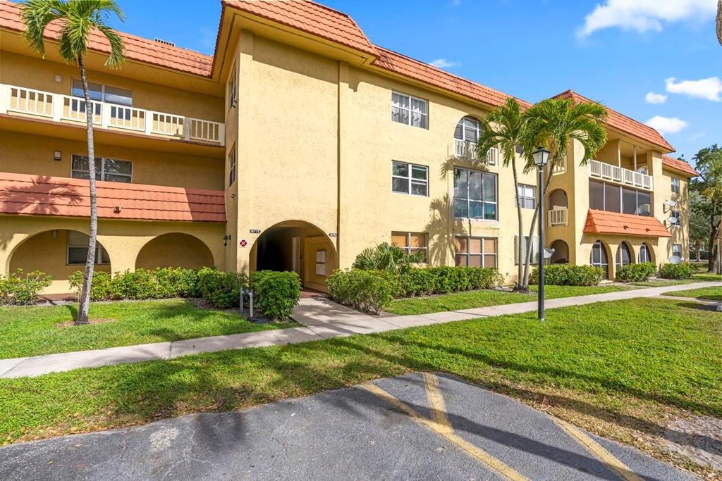 Photo of 10762 La Placida Drive #7-106, Coral Springs, FL 33065 (MLS # F10545596)