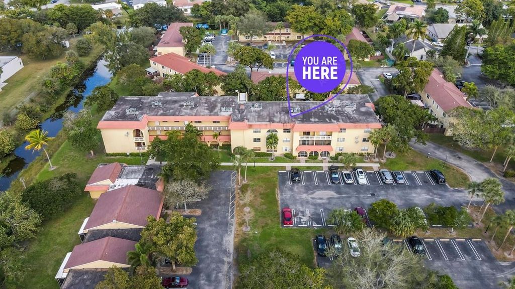 Photo of 10762 La Placida Drive #7-106, Coral Springs, FL 33065 (MLS # F10545596)