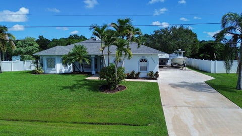 Photo of 3515 SW Macon Road, Port Saint Lucie, FL 34953 (MLS # B26090048)