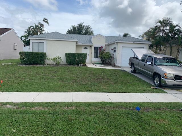 Wonderful opportunity to live in a desirable community in west Boca Raton, Florida. ''A'' rated schools from elementary to High School. The garage has been converted to the 3rd bedroom. Tile throughout, granite in the kitchen and bathrooms, stainless steel appliances. Tenant is responsible for the lawn care. Landlord will provide the washer and dryer for an additional $30.00 per month or tenant can provide their own.