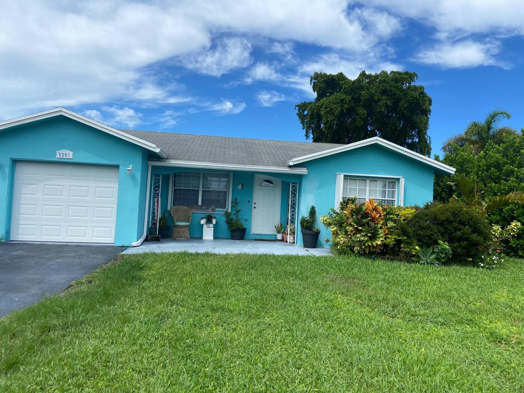 Photo of 8201 NW 103RD Avenue, Tamarac, FL 33321 (MLS # B26078513)