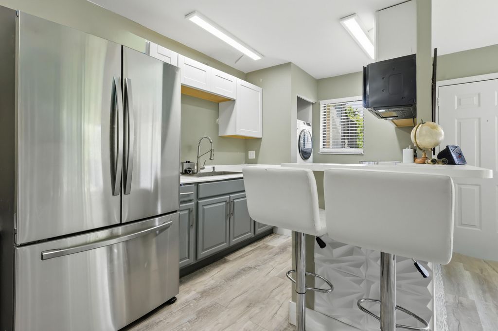 Photo of 545 Trace Circle #102, Deerfield Beach, FL 33441 (MLS # B26023697)