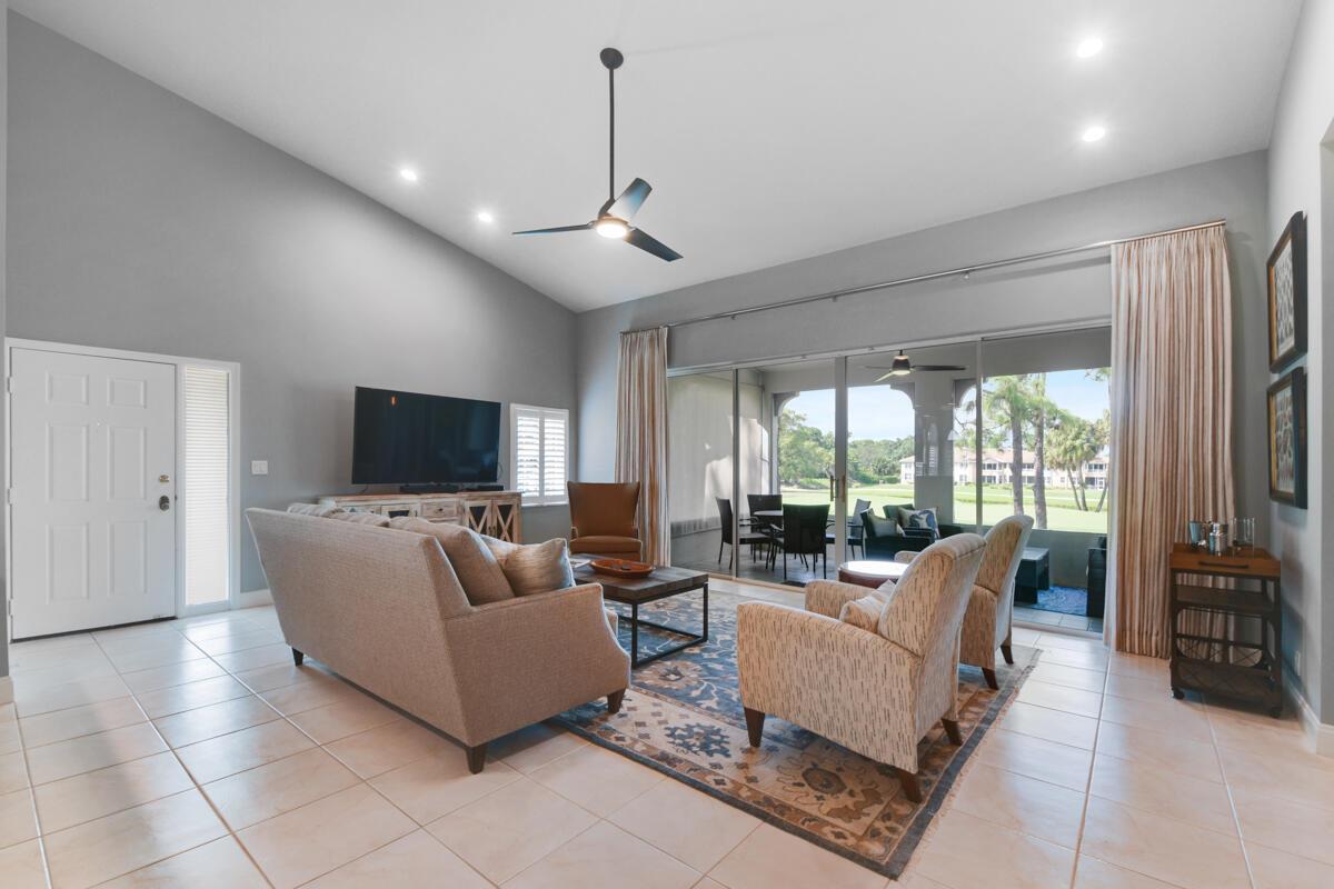 Beautifully updated and furnished 3 bedroom/ 2 bath/ 1 car garage unit on the 7th hole of the Championship Golf course. Available for rent for the season Jan-April for $8500.00/ month and off season for $4200/ month. The second story unit has amazing golf views from the living room and balcony. Enjoy the spacious living areas, updated kitchen, and 3 bedrooms. Laundry room in unit along with a 1 car garage. Enjoy all that PGA has to offer while living in this gorgeous unit across from the community pool.