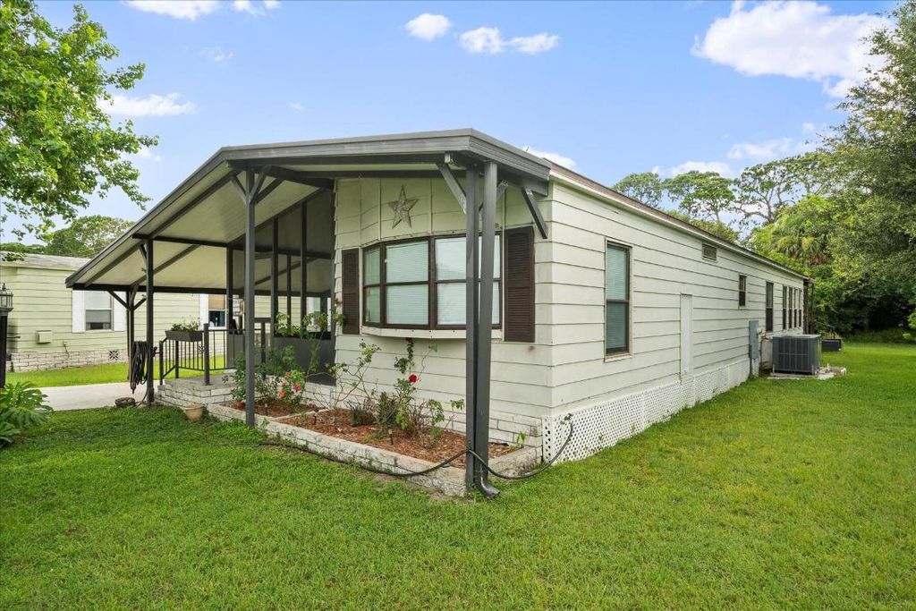 Photo of 4 Puerto Sol, Fort Pierce, FL 34951 (MLS # R10913734)