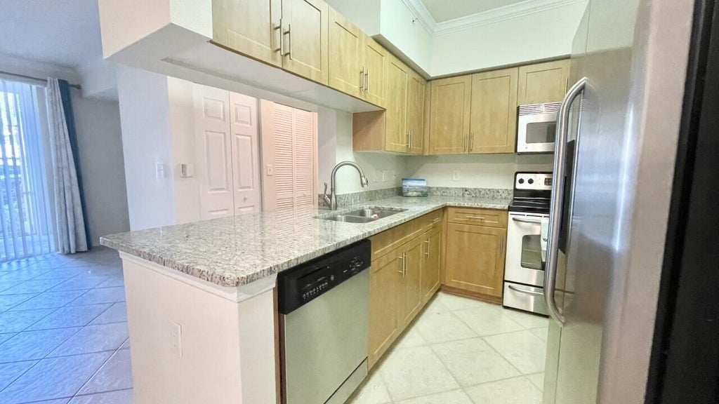 Photo of 6530 Emerald Dunes Drive, West Palm Beach, FL 33411 (MLS # B26086541)