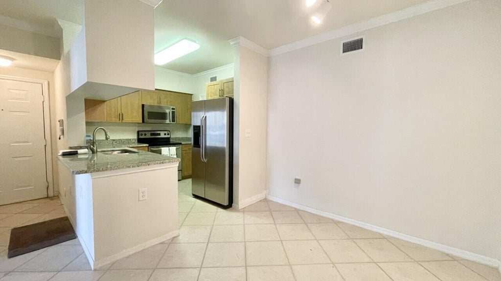 Photo of 6530 Emerald Dunes Drive, West Palm Beach, FL 33411 (MLS # B26086541)