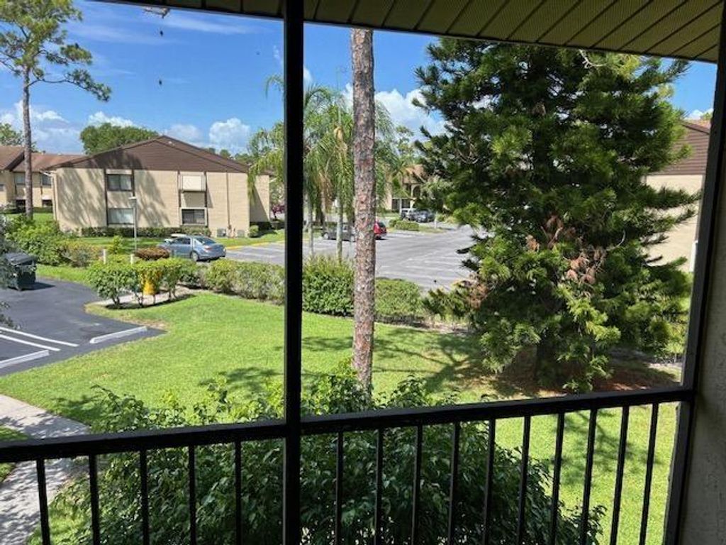 Photo of 335 Knotty Pine Circle #A2, Greenacres, FL 33463 (MLS # F10515562)