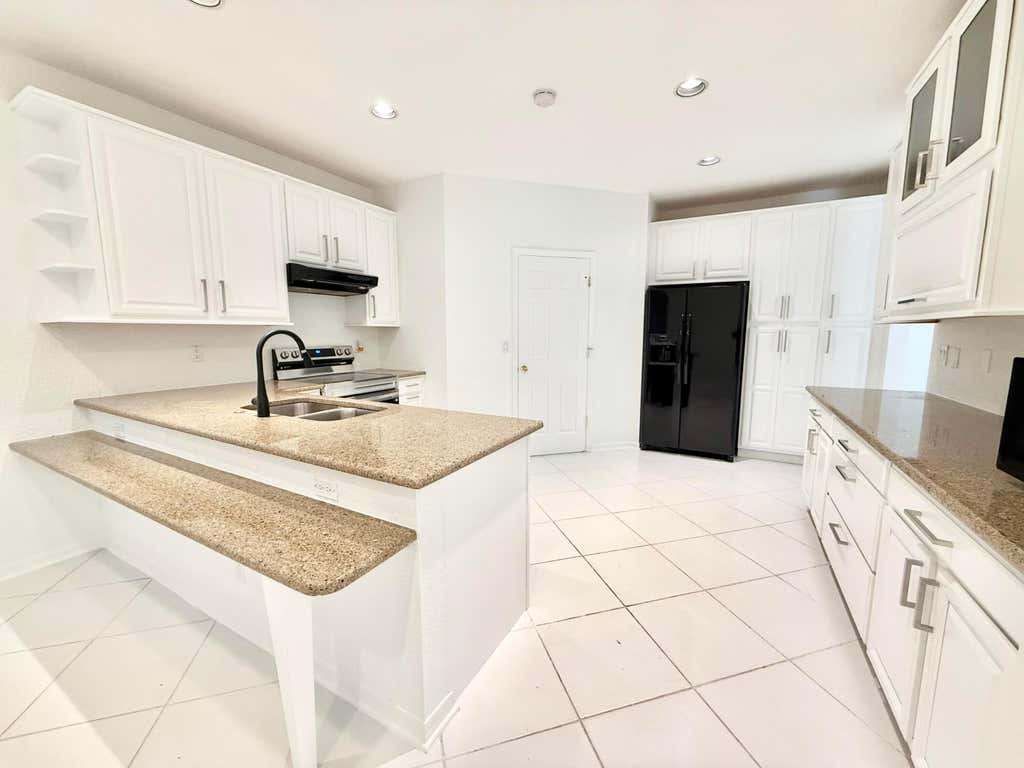 Photo of 12310 Riverfalls Court, Boca Raton, FL 33428 (MLS # B26049755)