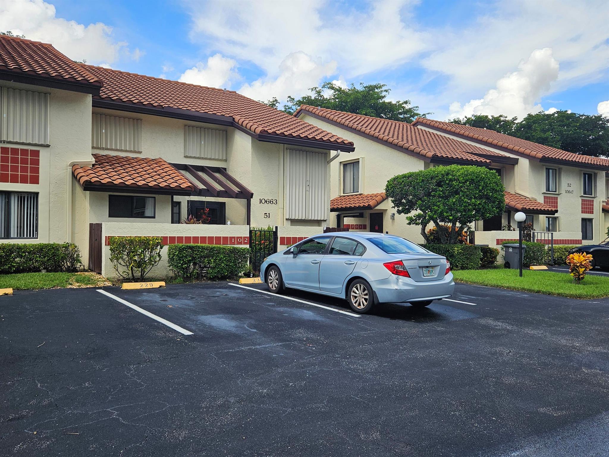 Beautifully updated first-floor condo with lake views in the gated community of Palm Chase! This spacious 2-bedroom, 2-bathroom home with a den offers an oversized screened-in patio overlooking the water. The open layout features a large living room, separate den/office, dining room, and an eat-in kitchen. The primary suite includes both a walk-in and standard closet, plus a private en-suite bath with a walk-in shower. Enjoy peace of mind with newer luxury vinyl flooring throughout, stainless steel appliances, washer and dryer, and A/C. A perfect blend of comfort, style, and functionality! The HOA has strong reserves, no assessments, and is approved for low down payment financing. Best of all, the monthly fee covers almost everything including Hotwire cable/internet, water and trash.