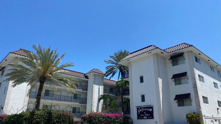 Top-floor 2BR/2BA corner unit in an unbeatable location just steps from Las Olas Blvd! This well-maintained 927 SF unit features a split-bedroom layout, each with custom walk-in closets. Open-concept living, dining, and kitchen with granite countertops, real wood cabinetry with pullouts, stainless steel appliances, and updated fixtures. Newer A/C and ample storage throughout. Secure building with gated FOB access, elevator, pool, laundry, 1 assigned parking space plus guest parking. Located in desirable Beverly Heights, approx. 500 ft to shops, restaurants, and entertainment on Las Olas. Fast application approval.