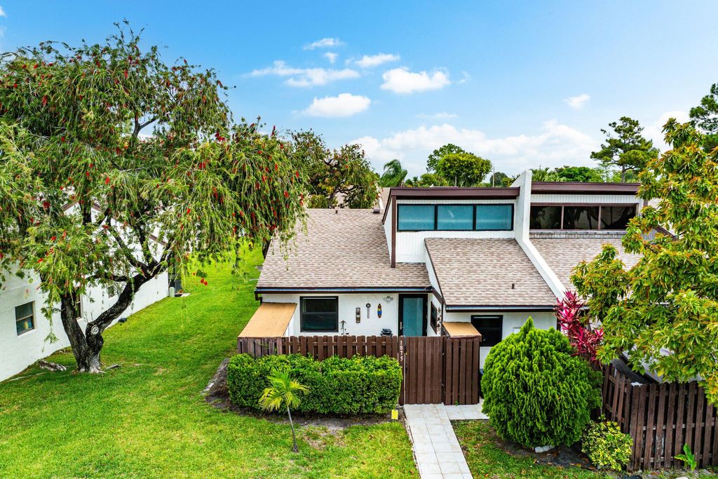 Photo of 1875 Abbey Road, West Palm Beach, FL 33415 (MLS # B26016879)