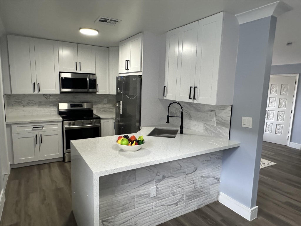 Photo of 814 SW 12TH Place, Fort Lauderdale, FL 33315 (MLS # B26062892)