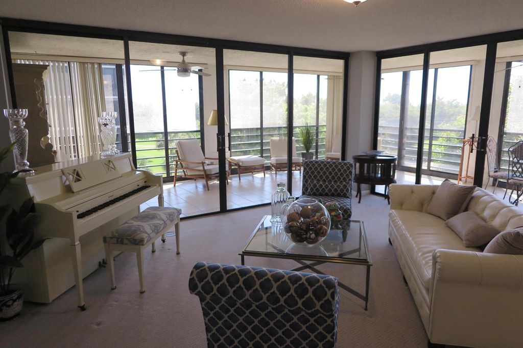 Photo of 7578 Regency Lake Drive #501, Boca Raton, FL 33433 (MLS # R11079140)