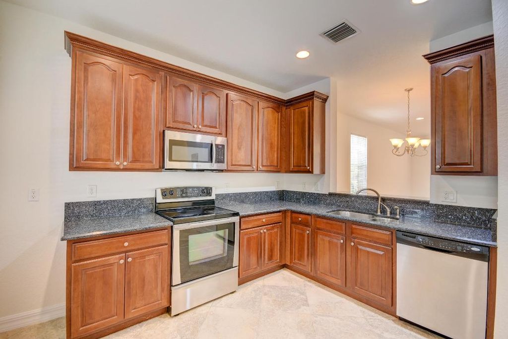 Photo of 110 E Pigeon Plum Drive #101, Jupiter, FL 33458 (MLS # R10947891)