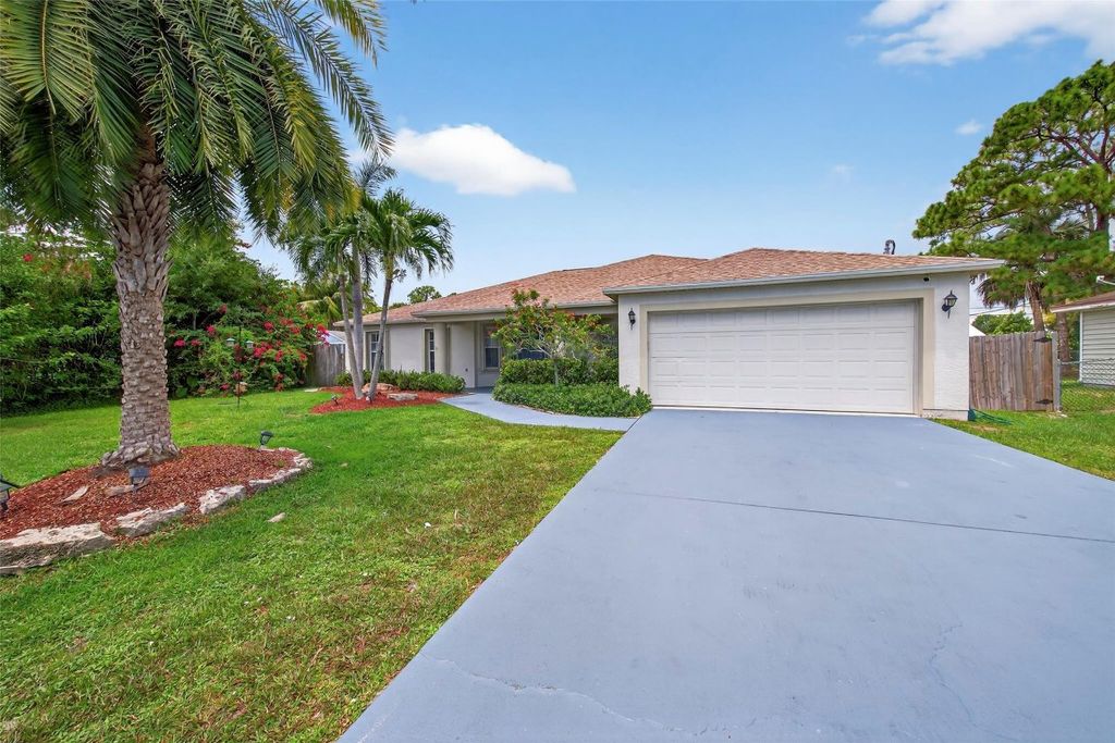 Photo of 1188 SW Curtis Street, Port Saint Lucie, FL 34983 (MLS # F10514482)