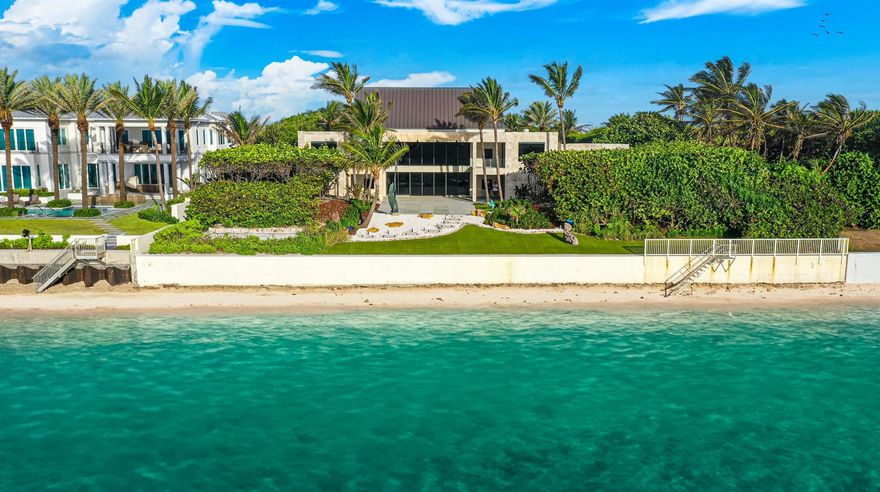 With renovations now complete, this high-elevation, coquina-clad estate presides over 150 feet both on the ocean and Intracoastal. A stunning collaboration between an award-winning architectural firm and renowned landscape architect, this luxe showcase captures the essence of opulence and excellence, with lofty ceilings, ocean-view window walls, a koi pond, sculpture gardens and cascading fountains.