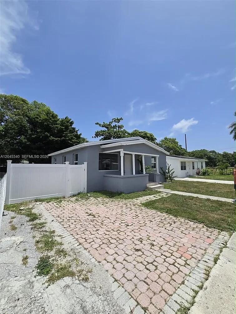 Photo of 720 LOCUST Street, West Palm Beach, FL 33405 (MLS # B26080910)