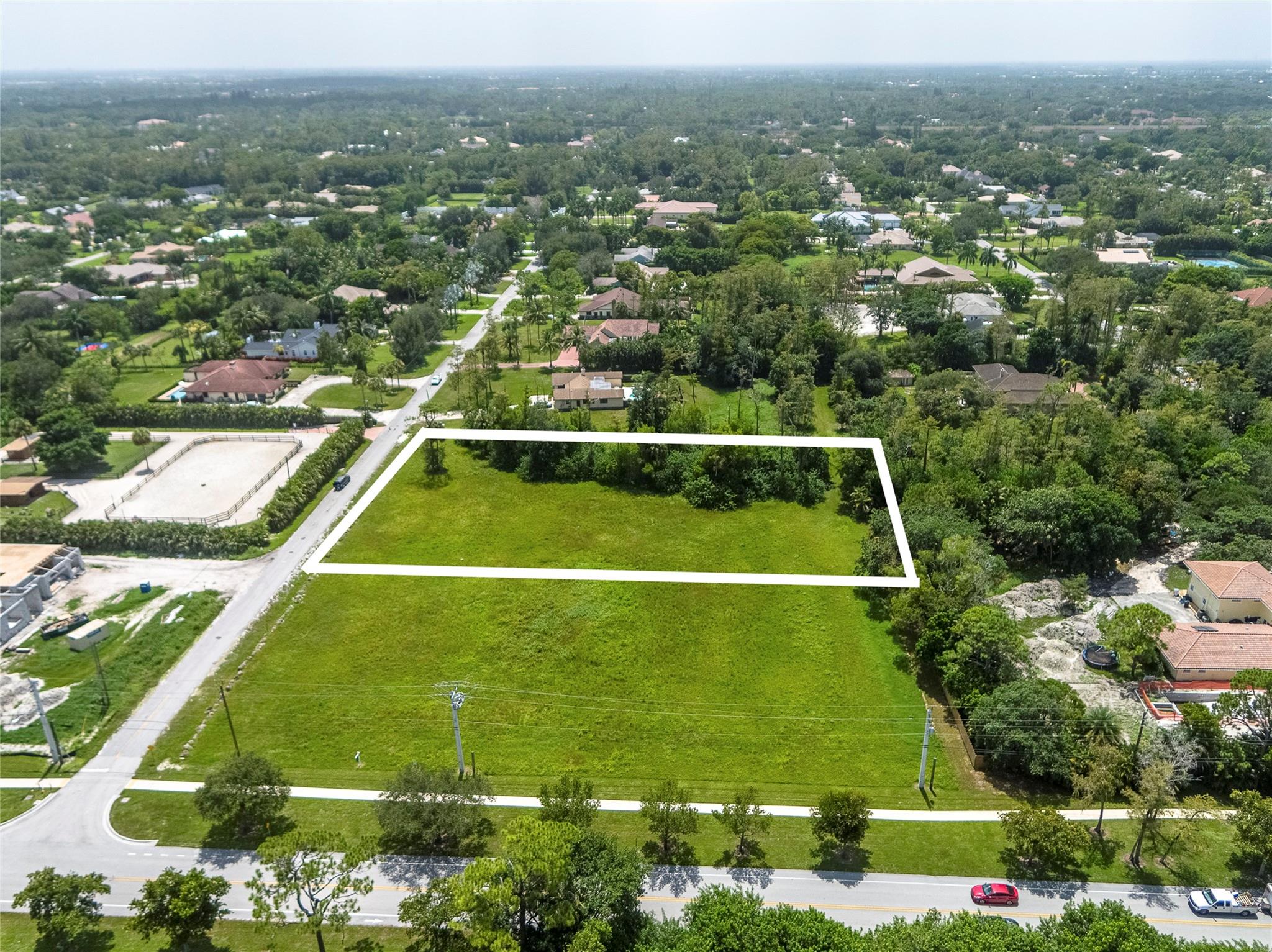 3-acre corner lot in Parkland! This HUGE lot can be split into 2 different parcels, or you can build your dream mansion on the entire 3 acres, the possibilities are endless! Prime location on the corner of Holmberg Road and NW 77th Terrace. No HOA, sidewalks, and streetlights in place. Undeveloped. Excellent location in the quiet and laid-back Parkland, with A+ schools, equestrian ranches, but still only minutes from Fort Lauderdale's dynamic nightlife, shopping, dining, and much more.