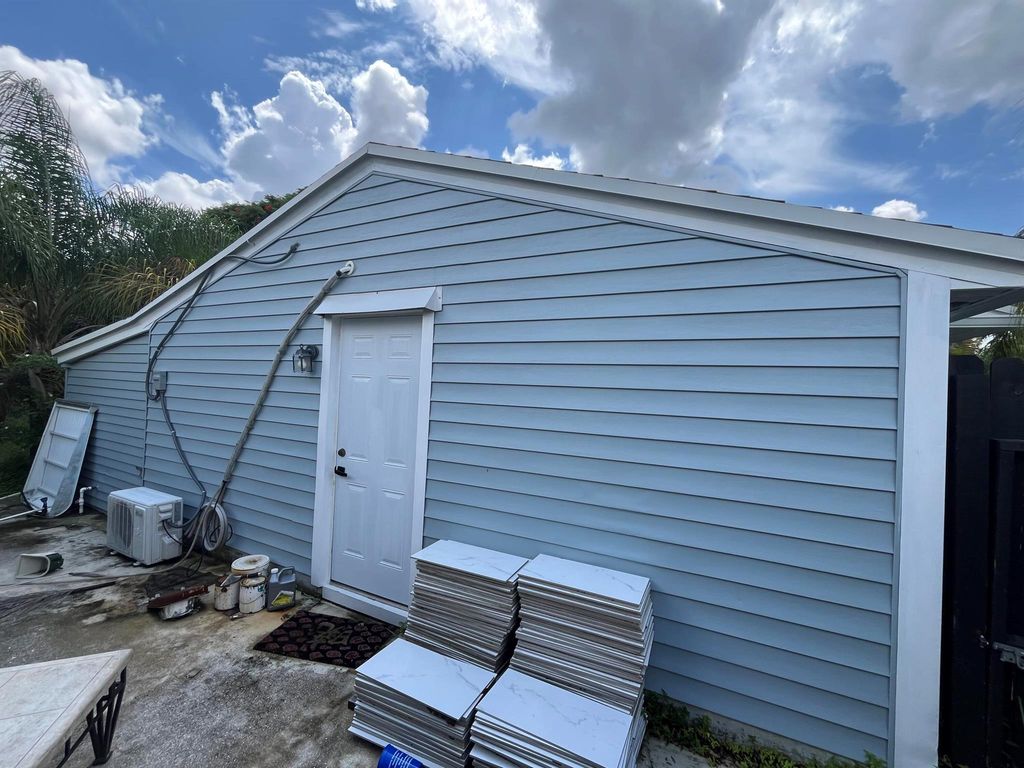 Photo of 3820 Corrigan Ct, Palm Springs, FL 33461 (MLS # R11026874)