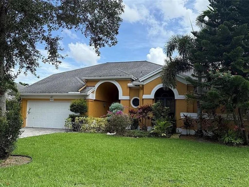 Photo of 4424 NW 52nd St, Coconut Creek, FL 33073 (MLS # F10535944)