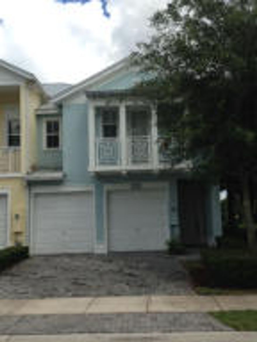 Gorgeous townhouse at the Reserve at Doral, great corner property with a nice lake view.