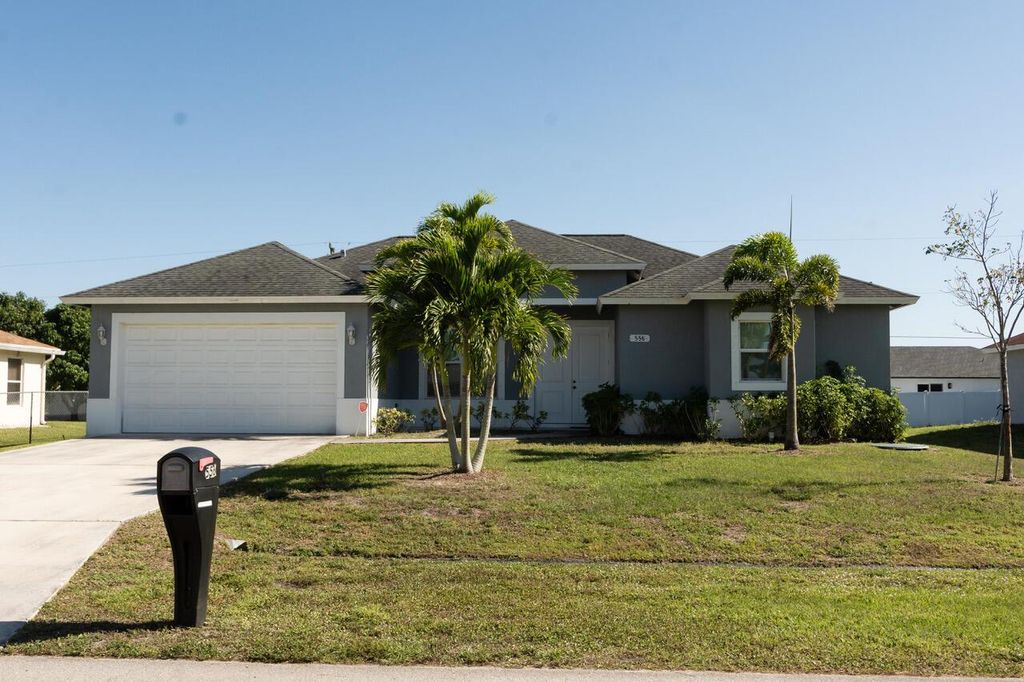 Photo of 556 SW Whitmore Drive, Port Saint Lucie, FL 34984 (MLS # R11082187)