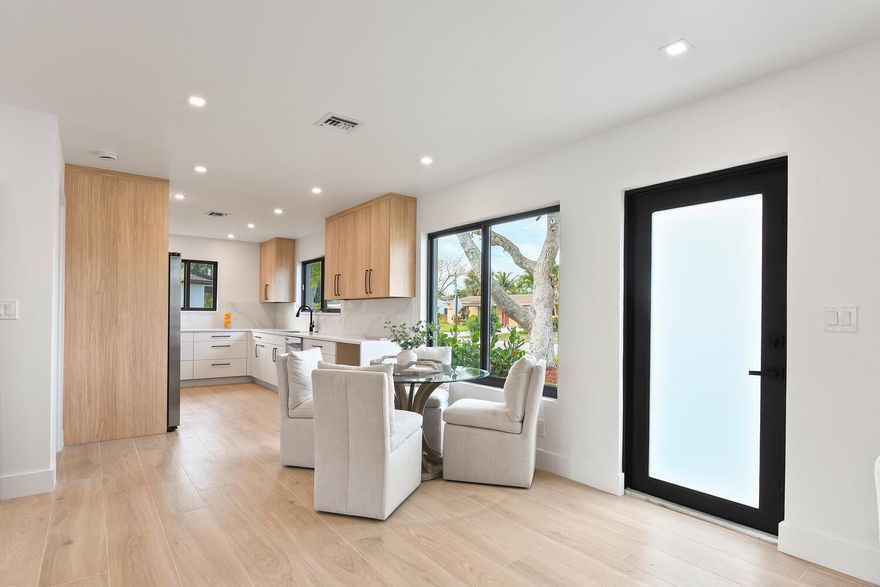 Completely re-built, all permits and architectural plans. Only thing original is the concrete block and the roof truss system. Great neighborhood, no rental restrictions, great investment and home.
New... roof, impact glass, kitchen, bathrooms, plumbing (including under the slab), appliances, floors, recessed lights, walk in closet etc etc etc