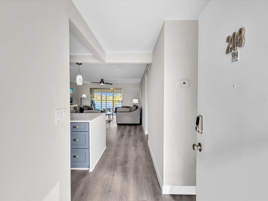 This  renovated 2/2 unit offers peaceful lake views from the large, screened balcony. Open kitchen with real wood cabinets, over-the-counter lighting, sensor faucet, workstation sink & new appliances (2024), updated bathrooms, high quality vinyl flooring, hurricane-impact windows with top down bottom up shades. Electrical panel & hot water heater (2023). Assigned parking spot right in front of unit! This inviting condo is move-in ready! Minutes from Dania Beach, the community offers a fantastic lifestyle close to everything shops, groceries, restaurants, Dania Beach Casino, Dania Pointe, Hollywood Broad walk, Gulfstream and Fort Lauderdale International Airport. Experience the best of Florida living in this cozy lakeside condo! All Assessments paid