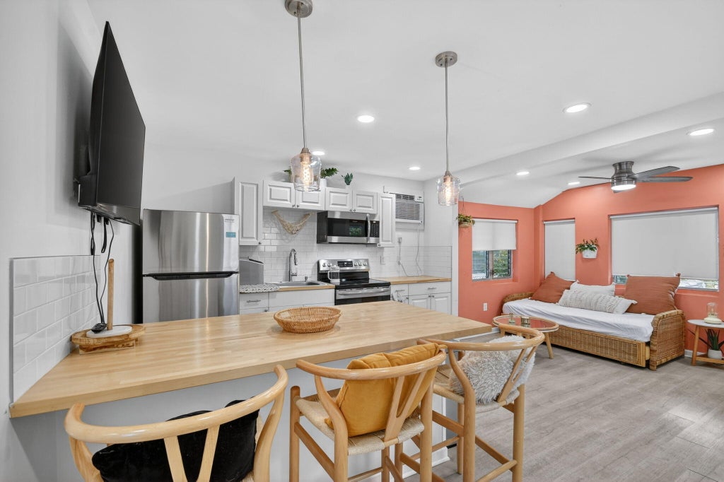 Photo of 306 N J Street, Lake Worth Beach, FL 33460 (MLS # B26084501)