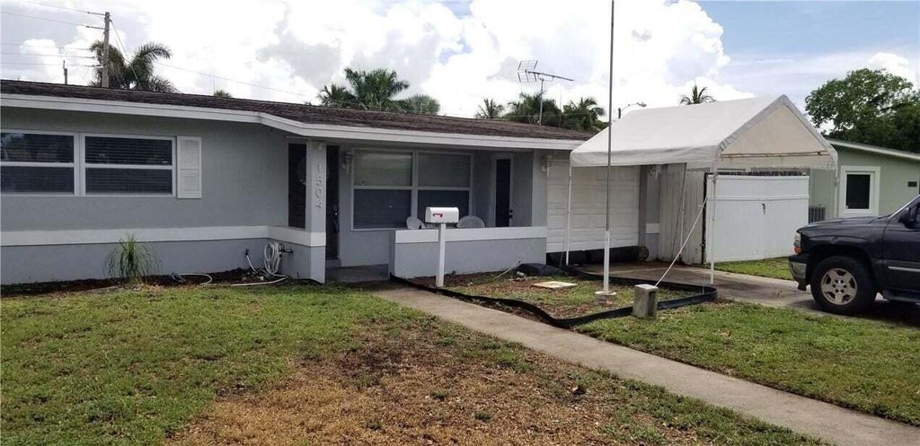 Photo of 1504 NE 2nd Street, Pompano Beach, FL 33060 (MLS # B26078636)