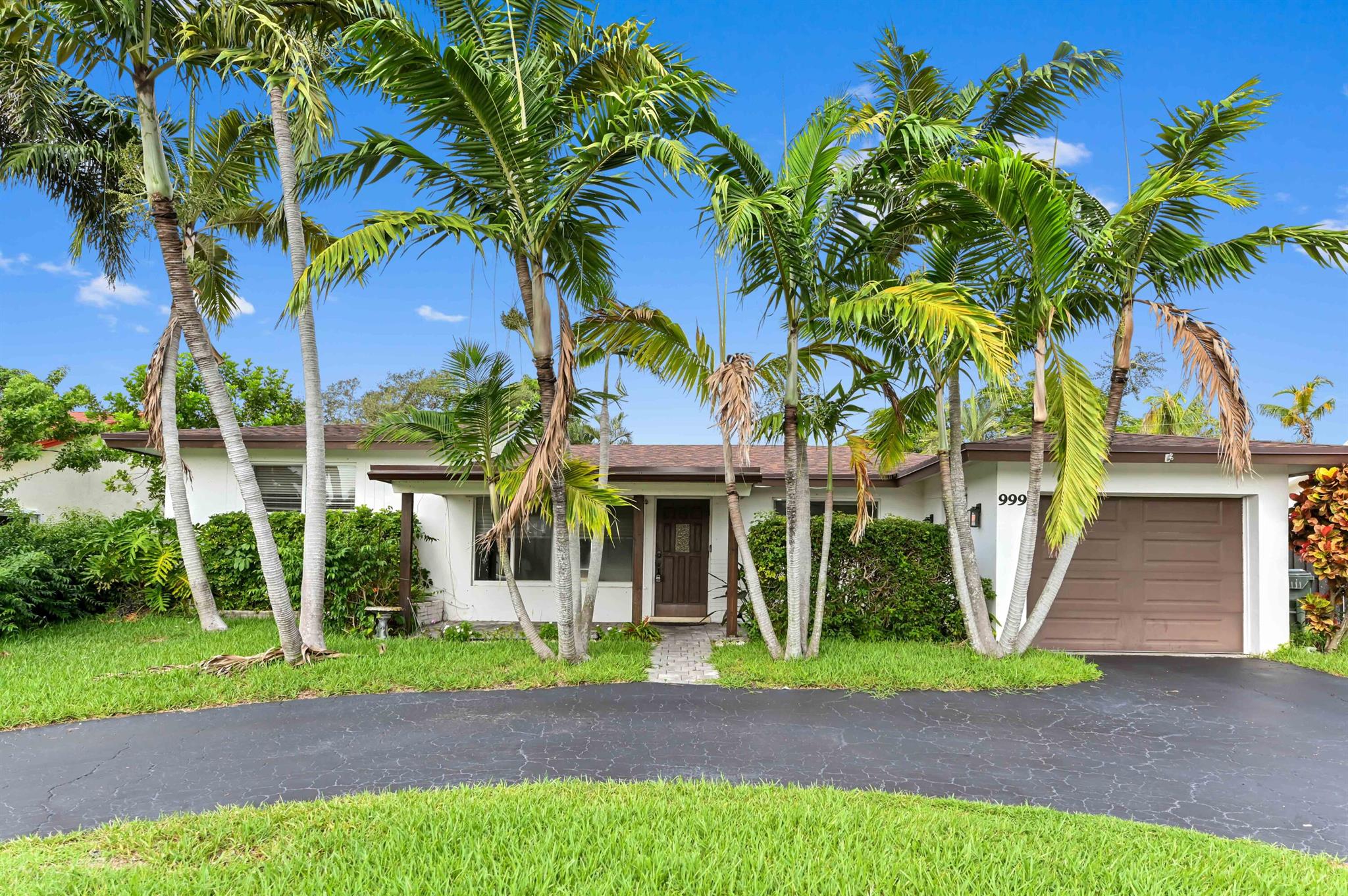 Discover this 3 bed, 2 bath rental with a 1-car garage, featuring a screened pool, spacious deck, and covered patio with a built-in bar--perfect for entertaining. The updated kitchen boasts granite countertops and stainless steel appliances. Enjoy the freedom of no HOA, with no pet, age, or vehicle restrictions. Located just minutes from Mizner Park's shops and dining, and a short drive to the beach. This is South Florida living at its best--comfort, convenience, and lifestyle all in one!