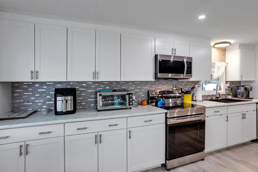 Photo of 33001 Azua Bay, Boynton Beach, FL 33436 (MLS # R11070895)