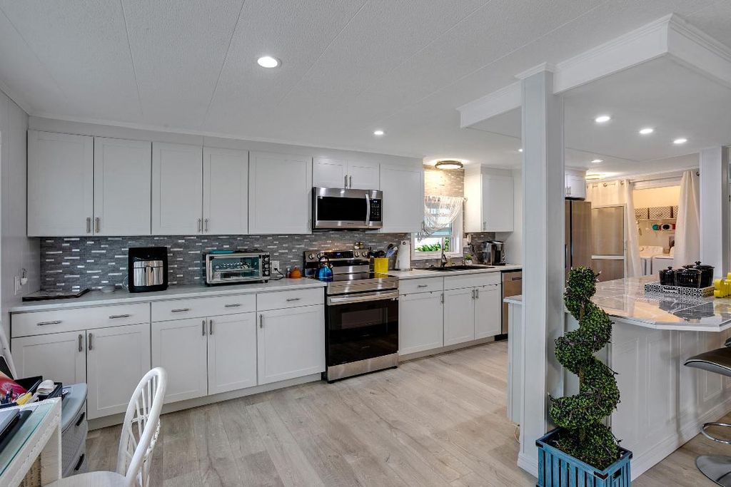 Photo of 33001 Azua Bay, Boynton Beach, FL 33436 (MLS # R11070895)