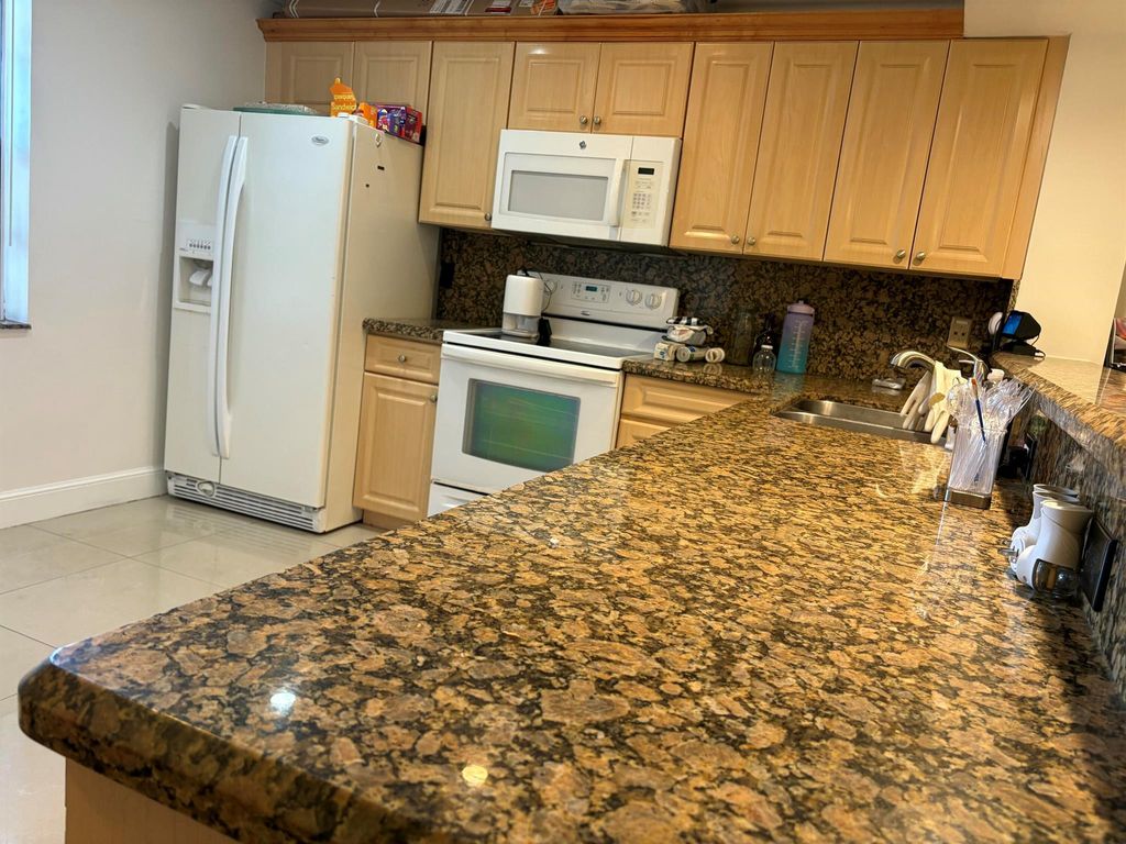 Photo of 1400 NW 45th Street #B7, Deerfield Beach, FL 33064 (MLS # R11137987)