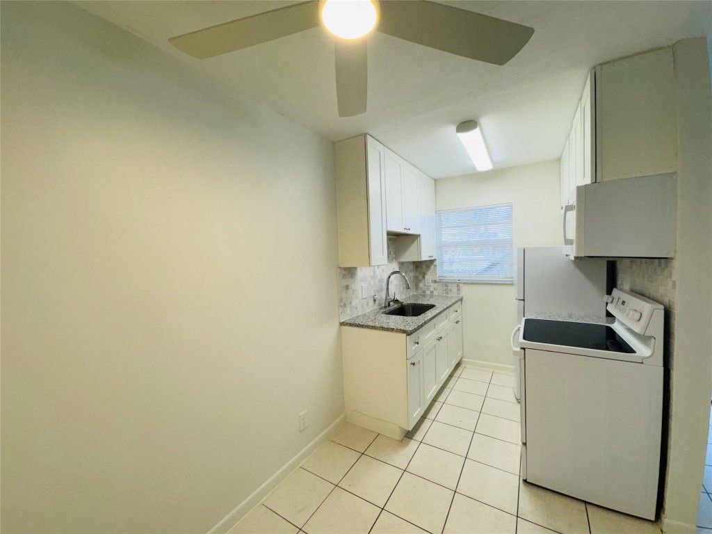 Photo of 801 S Federal Highway #104, Lake Worth Beach, FL 33460 (MLS # F10469348)