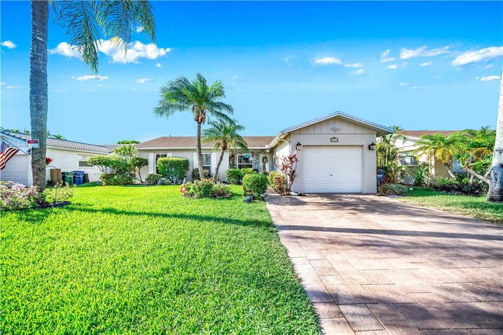Photo of 9811 NW 24th St, Coral Springs, FL 33065 (MLS # F10286353)