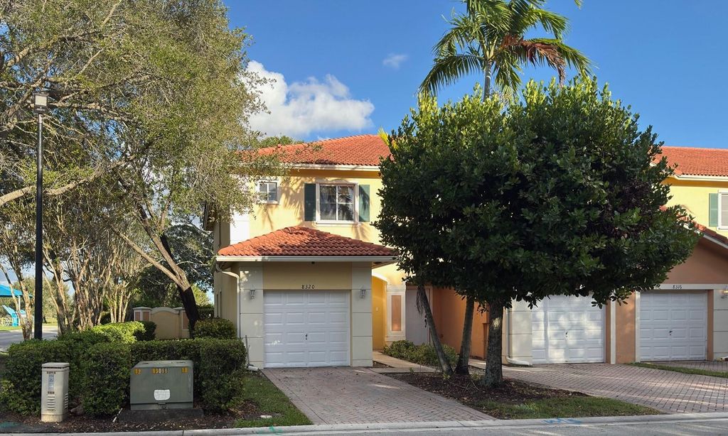 Photo of 8320 Santa Monica Avenue #8320, Tamarac, FL 33321 (MLS # B26056546)