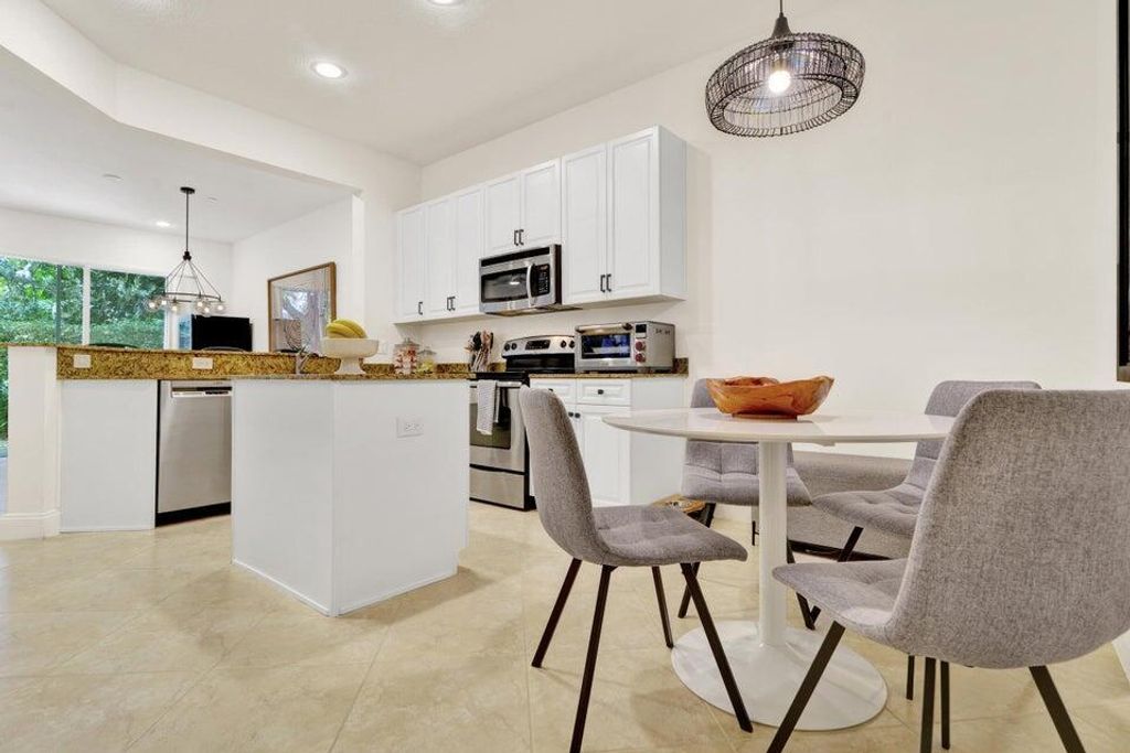 Photo of 124 W Prive Circle, Delray Beach, FL 33445 (MLS # R11090661)