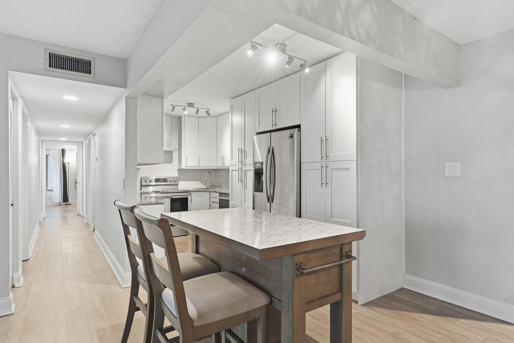 Photo of 1104 GREEN PINE Boulevard #G1, West Palm Beach, FL 33409 (MLS # B26074852)