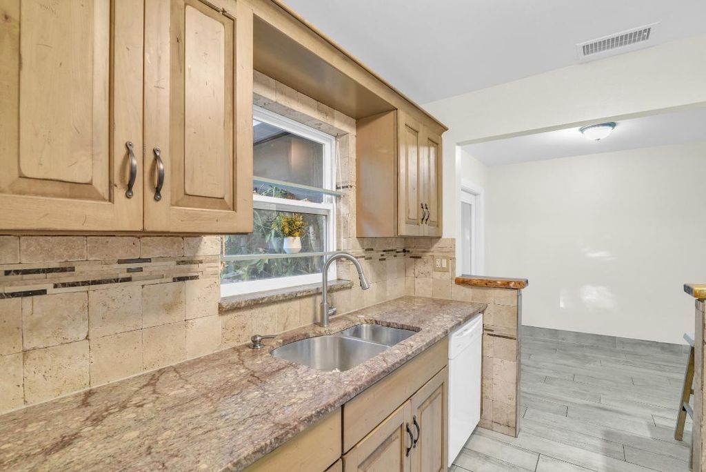 Photo of 1317 S N Street, Lake Worth Beach, FL 33460 (MLS # R11068217)