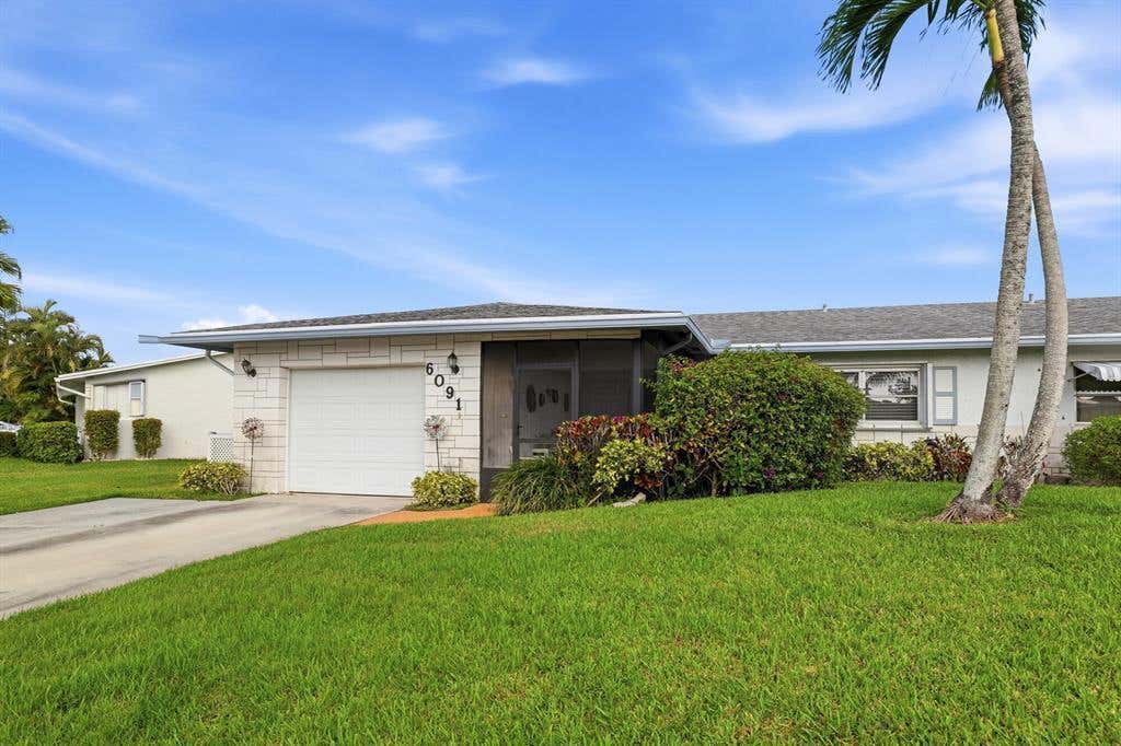 Photo of 6091 Dusenburg Road, Delray Beach, FL 33484 (MLS # B26045023)