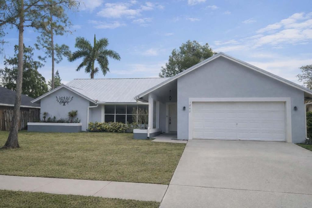 Photo of 1262 Primrose Lane, Wellington, FL 33414 (MLS # B26016620)