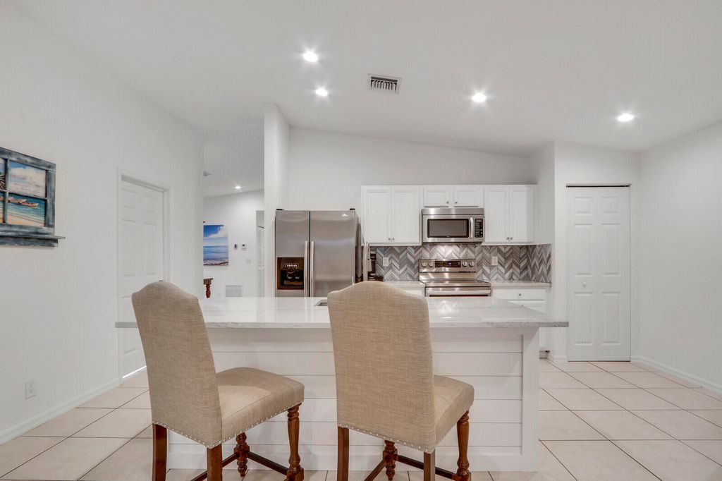 Photo of 4814 SE Graham Drive, Stuart, FL 34997 (MLS # R10961447)