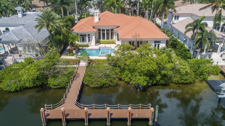 Nestled along the picturesque waterways of Harbour Isles in Florida, this magnificent waterfront property is a true embodiment of luxury living. With a sprawling 100-foot lot and captivating views that stretch as far as the eye can see, this 4-bedroom, 4.5-bathroom haven boasts an open and spacious floor plan, making it the epitome of comfort and sophistication. From its convenient location to the meticulous details throughout, every aspect of this home has been designed to offer an exceptional living experience. The allure of this Harbour Isles gem begins with its coveted location. Situated in a prime waterfront community, this home offers the epitome of Florida living. Its unique position provides unparalleled access to the water, making it a paradise for boating enthusiasts. In fact, you'll find that it's just a 2-minute boat ride away from the intracoastal, allowing you to easily explore the stunning waterways of the region. As you step inside this exquisite home, you're greeted by the grandeur of its 16-foot ceilings, adorned with incredible detailing that adds a touch of elegance to every room. The architectural prowess is evident throughout the property, from the moment you enter the front door until you reach the backyard oasis. This exceptional craftsmanship sets this home apart and adds a sense of opulence to every corner. The layout of this home has been meticulously designed to ensure a seamless flow between rooms. From the foyer, you'll be drawn into the heart of the home, where the living, dining, and kitchen spaces meld effortlessly together. The open floor plan creates an inviting atmosphere, perfect for entertaining friends and family. With generous spaces and an abundance of natural light, every room feels welcoming and airy. The beauty of this Harbour Isles home extends beyond its interiors. Step outside, and you'll find a stunning outdoor oasis that rivals the most luxurious resorts. A huge pool, complete with an attached spa, beckons you to relax and unwind under the Florida sun. The lush landscaping and well-manicured gardens provide privacy and create a tranquil atmosphere, ensuring that every moment spent outdoors is a moment of pure serenity. This home offers not only elegance but also peace of mind. The roof was replaced in 2018, ensuring the structural integrity and energy efficiency of the property. The dock, a key feature for water enthusiasts, was resurfaced in 2021 and now boasts new composite decking. This means you can enjoy your boat without worrying about wear and tear on the dock. Furthermore, a new whole-house generator was installed in 2021, ensuring that you'll always have power, even during Florida's notorious storms. One of the perks of living in this Harbour Isles neighborhood is the availability of natural gas. Whether you're a passionate chef who loves cooking with a gas stove or you appreciate the cost savings and convenience of gas appliances, having access to natural gas is a valuable feature that enhances your daily life. The four bedrooms in this home provide ample space for family and guests. Each bedroom is a sanctuary of comfort and style, with thoughtfully designed en-suite bathrooms that offer privacy and convenience. Whether you're retreating to the master suite or welcoming guests in the guest bedrooms, every corner of this home exudes luxury and relaxation. This incredible waterfront property in Harbour Isles, Florida, is more than just a home; it's a lifestyle. With its expansive 100-foot lot, breathtaking views, and meticulous attention to detail, it's a testament to the elegance and comfort that can be achieved in waterfront living. The open floor plan, resort-style outdoor living space, and modern amenities such as the new roof, dock, and whole-house generator make it a place where you can truly enjoy the Florida dream. Add to that the convenience of natural gas and the allure of a 2-minute boat ride to the intracoastal, and you have a property that offers a truly unparalleled living experience. Don't miss the opportunity to make this luxurious retreat your own.