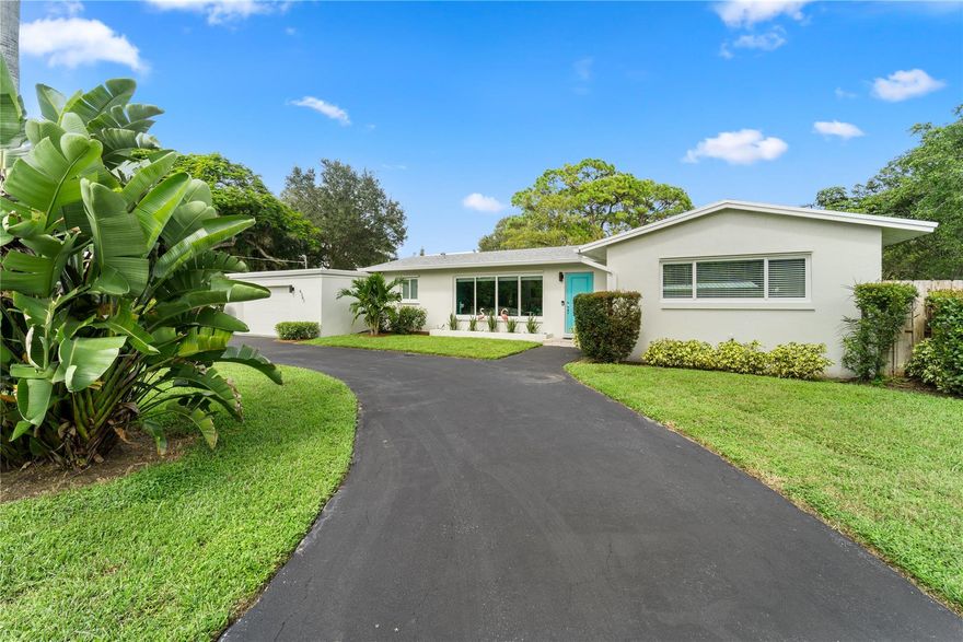 Welcome to your dream home in sought-after Country Club Estates, Plantation! This spacious 2 bed/2 bath gem features one of the neighborhood's largest backyards for a nature lover's delight. Enjoy a cozy wood-burning fireplace in an oversized sunroom. Imagine sipping morning coffee while surrounded by towering pines in your own backyard. The new roof with algaecide treatment brings peace of mind. Impact windows & doors enhance energy efficiency & curb appeal. Fresh paint inside & out radiates Florida lifestyle. The kitchen boasts stainless appliances and granite countertops. LED lighting & crown moldings add functionality & elegance. RV hookup & 60-amp EV charging in the garage with a Tesla adapter. Don't miss this sunlit retreat!