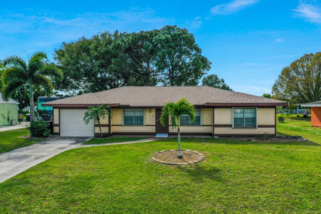 Photo of 632 SW Everett Ct, Port Saint Lucie, FL 34953 (MLS # R10954256)